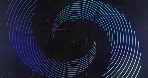 Image of spinning lines over hexagons on black background Stockfoto's