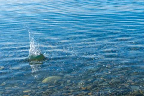 Image of a splash at sea. Stock Photos