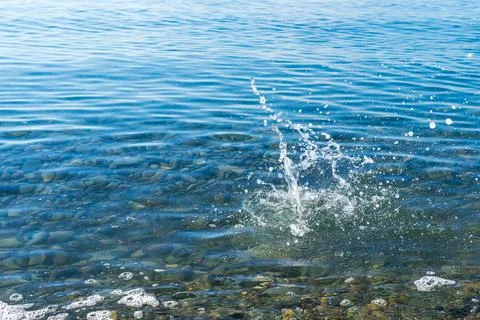 Image of a splash at sea. Stock Photos