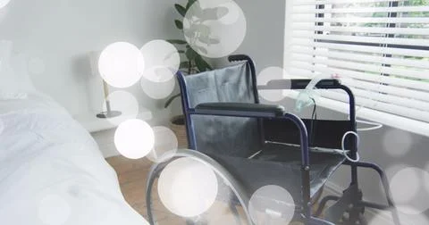 Image of spots over wheelchair Ilustração Stock