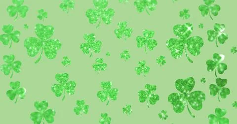 Image of st patricks day multiple shimmering green shamrocks falling Stockillustratie