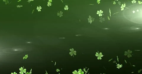 Image of st patricks day multiple shimmering floating green shamrocks on top and Illustrazione stock