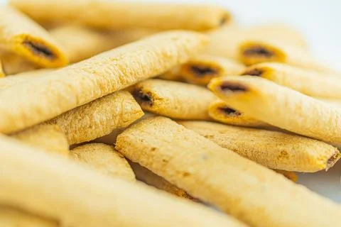 Image of a stacked collection of flat, crisp food slices, possibly bread or.. 스톡 사진