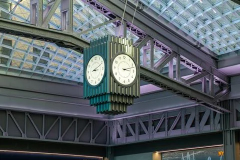 Image of the station's clock in the Daniel Patrick Moynihan Train Hall Stock Photos