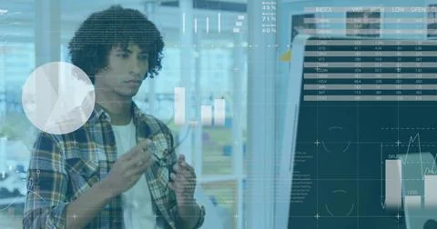 Image of statistical data processing against thoughtful biracial man using Stock Photos