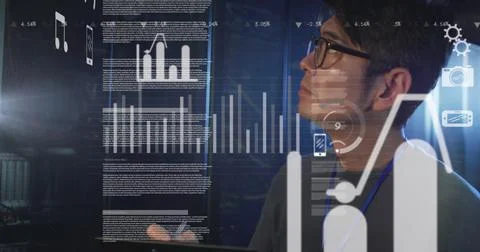 Image of statistical data processing against asian male engineer using tablet at 스톡 사진