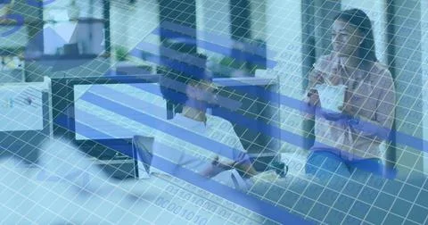 Image of statistical data processing against diverse man and woman discussing at 库存照片