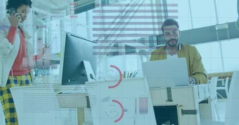 Image of statistical data processing against biracial man using laptop at office Foto stock