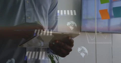 Image of statistical data processing against mid section of a man using tablet Stock Photos