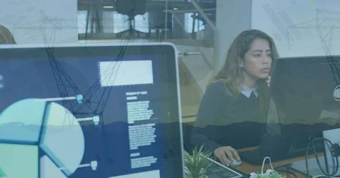 Image of statistical data processing over biracial woman using computer against Stock Photos