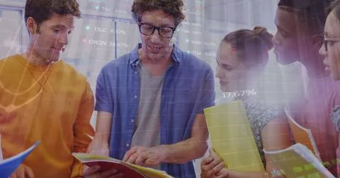 Image of statistical data processing over diverse colleagues discussing over Stock Photos