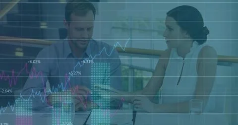 Image of statistical data processing over caucasian man and woman discussing Stock Photos