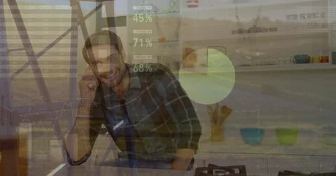 Image of statistical data processing over caucasian man talking on smartphone at Foto stock