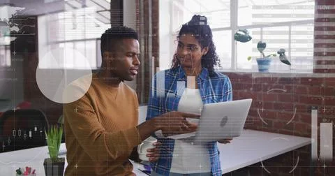 Image of statistical data processing over diverse man and woman discussing over Stock Photos