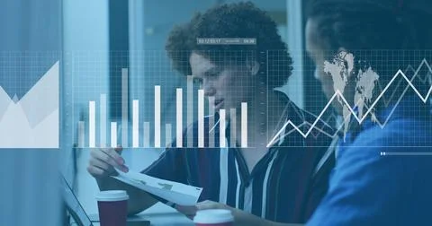 Image of statistical data processing over two diverse man discussing over a 库存照片