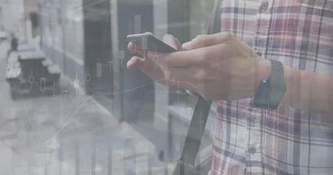 Image of statistical data processing over mid section of a man using smartphone 스톡 사진