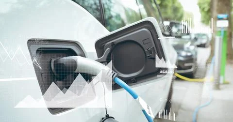 Image of statistical data processing over electric car charging at a charging Stock Photos