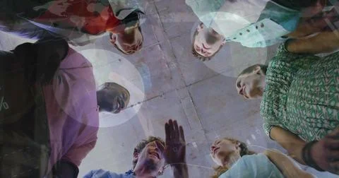 Image of statistical data processing over diverse colleagues stacking hands Stock Photos