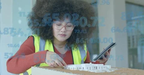 Image of statistics and data processing over biracial female architect in office Stock Illustration