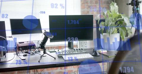 Image of statistics and data processing over computer on desk in office Foto stock