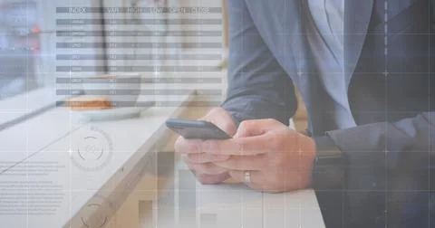 Image of statistics and data processing over man using smartphone 写真素材
