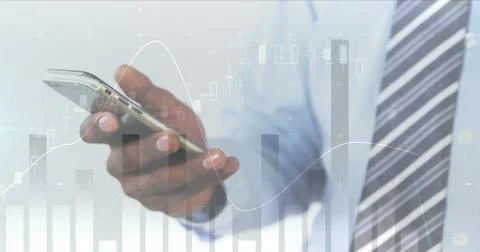 Image of statistics and data processing over man using smartphone Foto stock