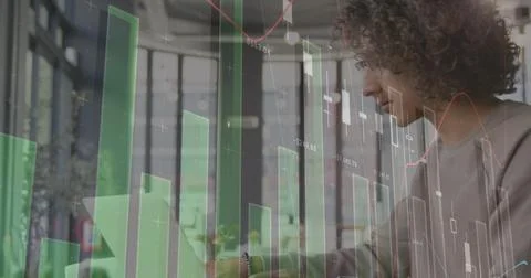 Image of statistics and data processing over man using laptop 库存照片