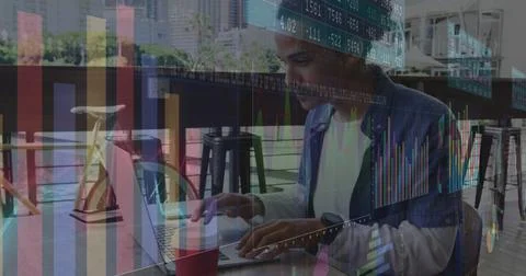 Image of statistics and data processing over man using laptop Stock Photos