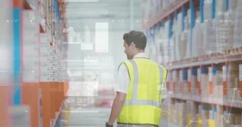 Image of statistics and data processing over caucasian man working in warehou Stock Photos
