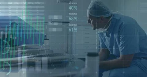 Image of statistics and data processing over caucasian male surgeon Foto stock