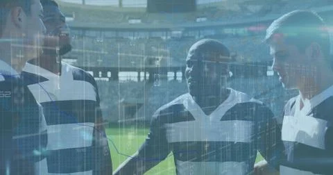 Image of statistics and data processing over rugby players on sports stadium Foto stock