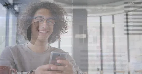 Image of statistics and data processing over man using smartphone 写真素材