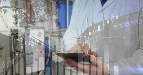 Image of statistics and data processing over caucasian man using tablet Stock Photos