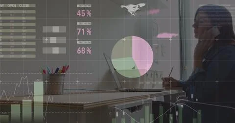 Image of statistics and data processing over man using computer Foto stock