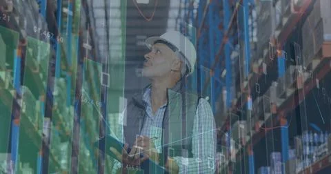 Image of statistics and financial data processing over man working in warehouse Illustrazione stock
