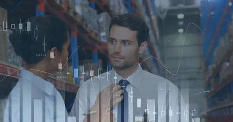 Image of statistics and financial data processing over man and woman working in Stock Photos