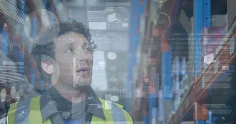 Image of statistics and financial data processing over man working in warehouse Foto stock