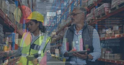 Image of statistics and financial data processing over man and woman working in Stock Photos