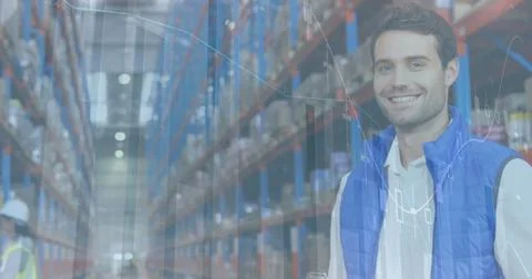 Image of statistics and financial data processing over man working in warehouse Foto stock