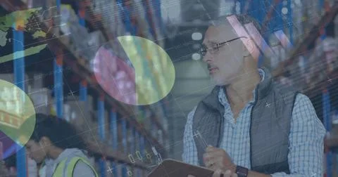 Image of statistics and financial data processing over man and woman working in Stock Photos