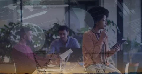 Image of statistics and financial data processing over diverse business peo.. Foto stock