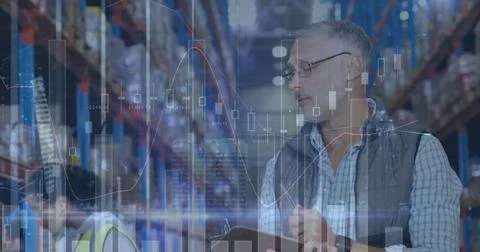 Image of statistics and financial data processing over man and woman working in Stock Photos