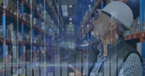 Image of statistics and financial data processing over man working in warehouse Foto stock