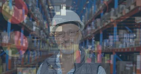 Image of statistics and financial data processing over man working in warehouse Foto stock