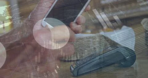 Image of statistics and financial data processing over caucasian man paying with Stock Photos