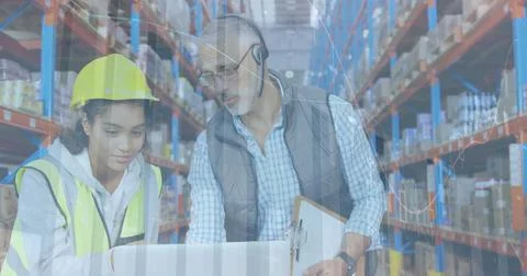 Image of statistics financial data processing over man and woman working in Stock Photos