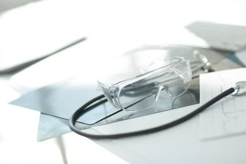 Image stethoscope and documents on the table at the surgeon Stock Photos