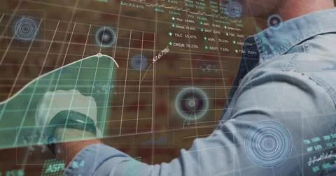 Image of stock market and data processing over caucasian man checking smartwatch Stock Photos