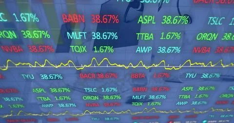 Image of stock market data processing against computers on office desks Foto stock