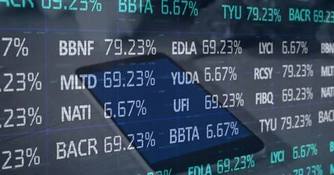 Image of stock market data processing against close up of a digital tablet 写真素材